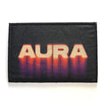 Black patch with 'AURA' in orange gradient on a white background