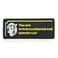 Embroidered patch with text 'You are overencumbered and cannot run!' on a black background